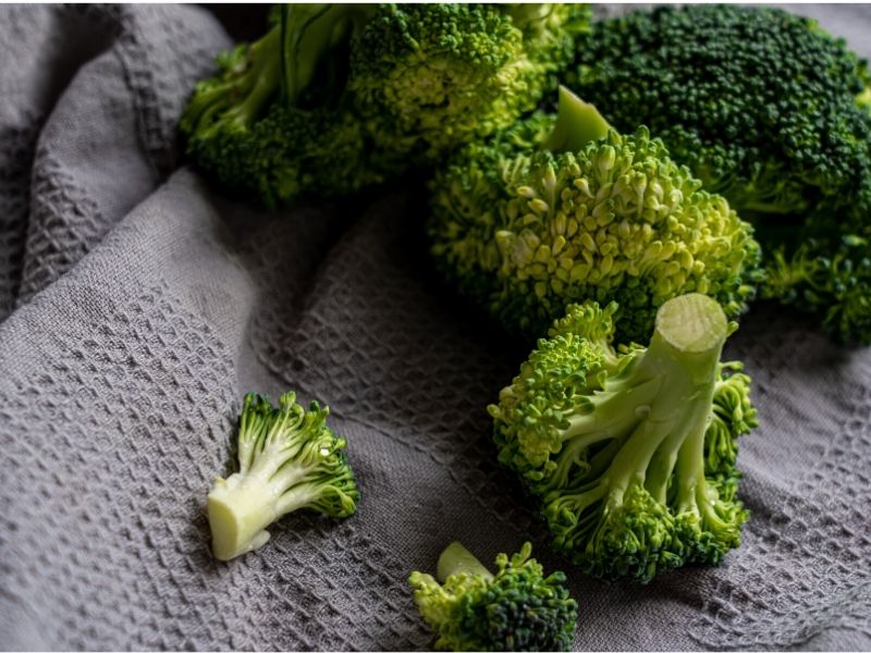 green broccoli on gray towel 