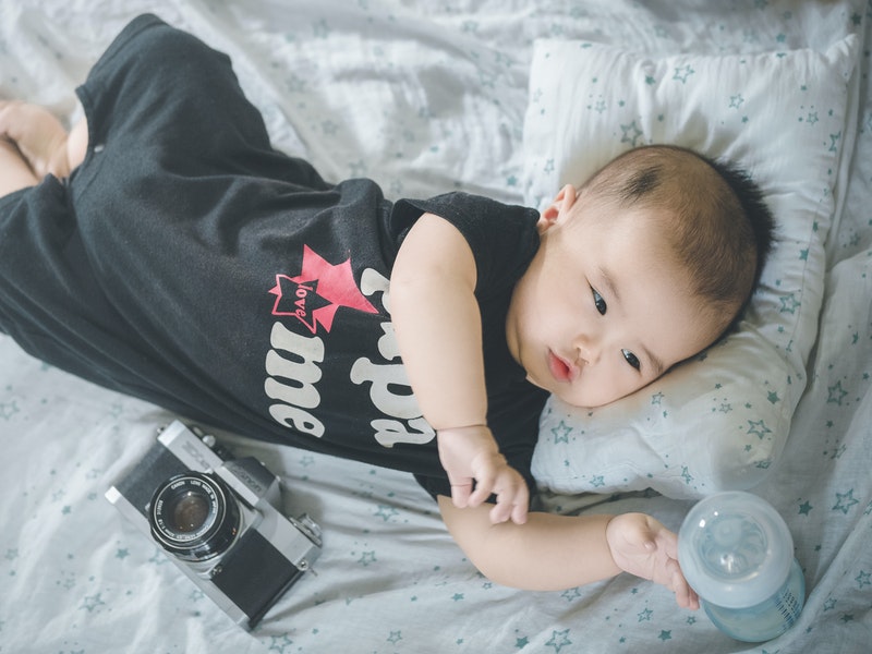 baby with milk bottle 
