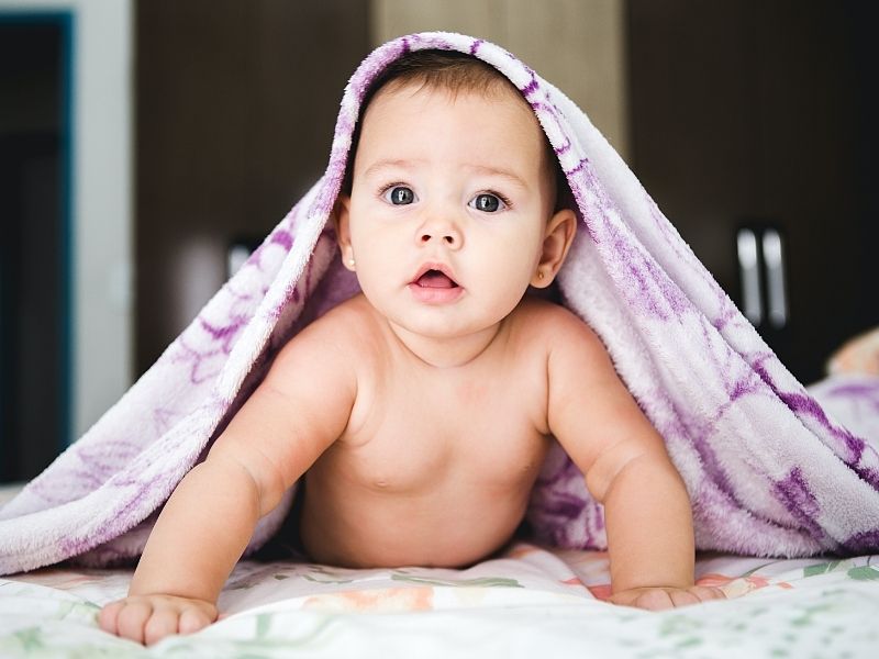 baby under blanket, baby growth and development