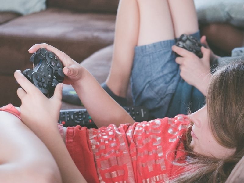 Kids playing console game 