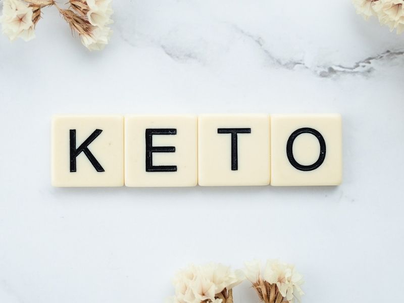 scrabble tiles spelling out keto 