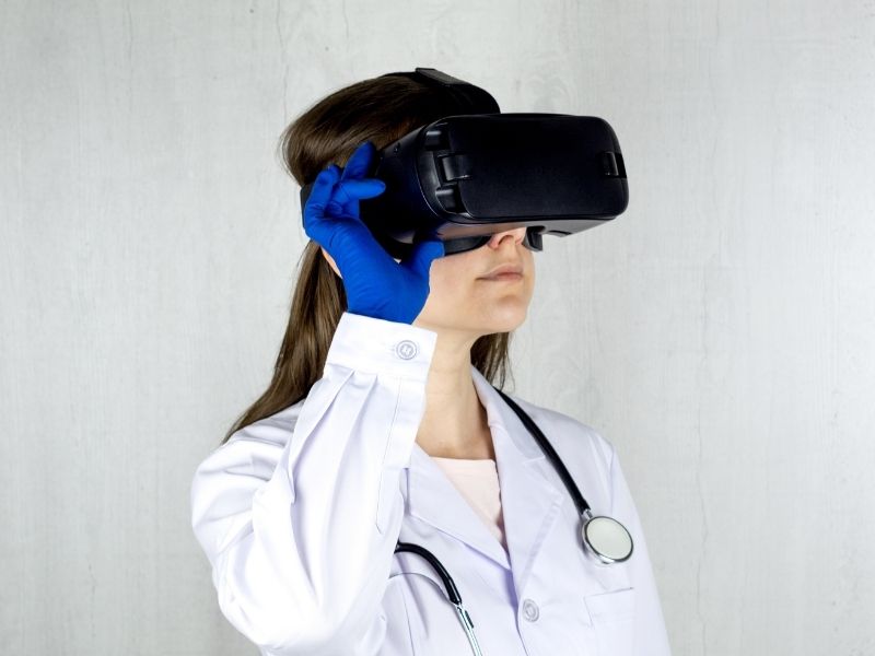 A doctor wearing a VR headset