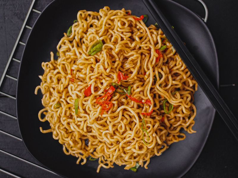 A noodle dish with chilies