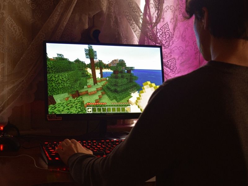 guy playing game on computer rpg games for pc