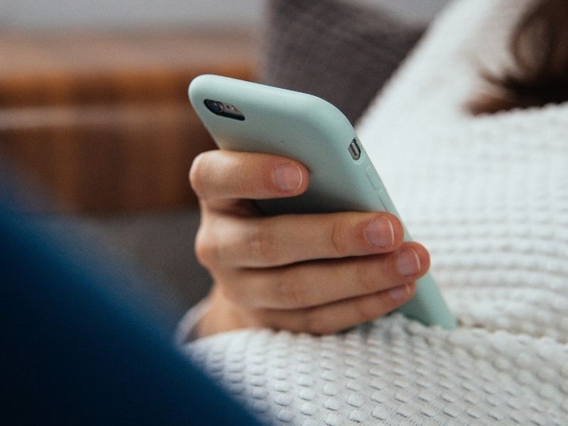 woman holding a smartphone