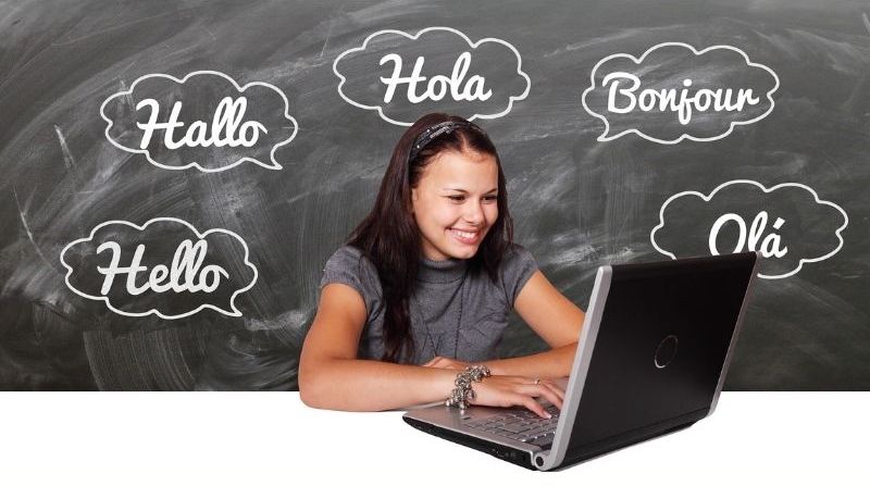 girl learning language on laptop