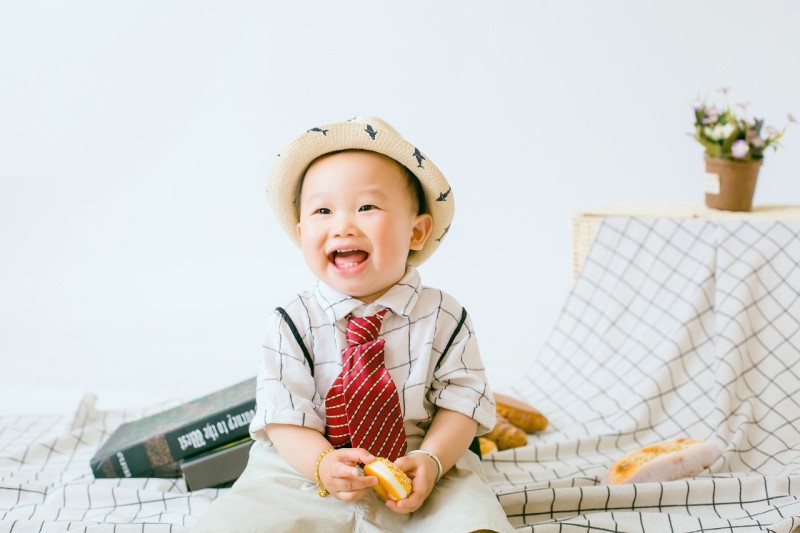 popular boy names, baby boy wearing fedora and tie