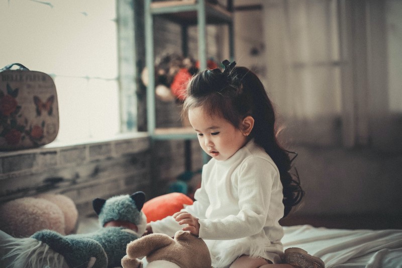 baby girl with long hair