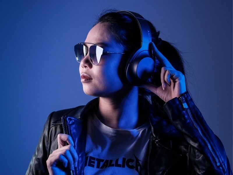 A girl listening to music with headphones