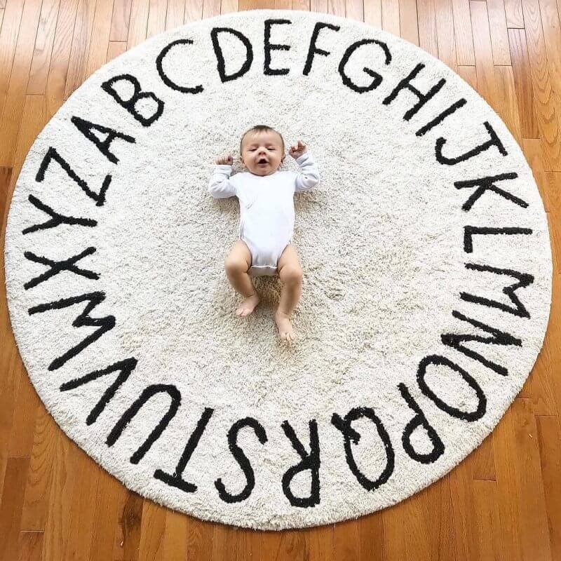 baby on rug