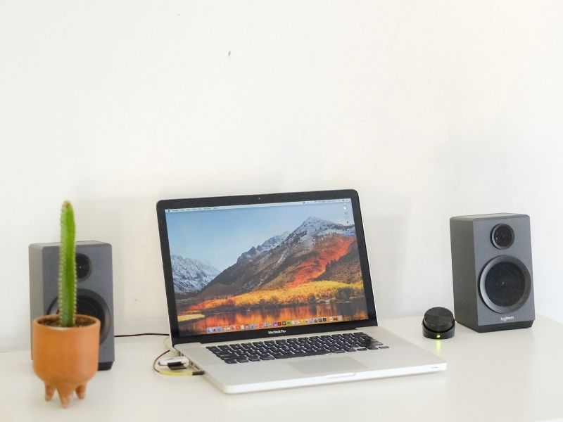 A laptop with external speakers