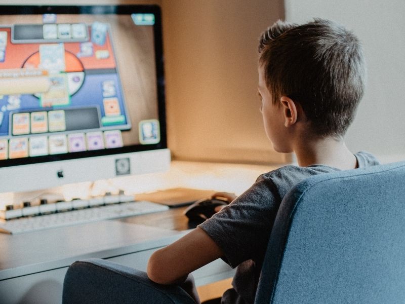 A boy playing a computer game