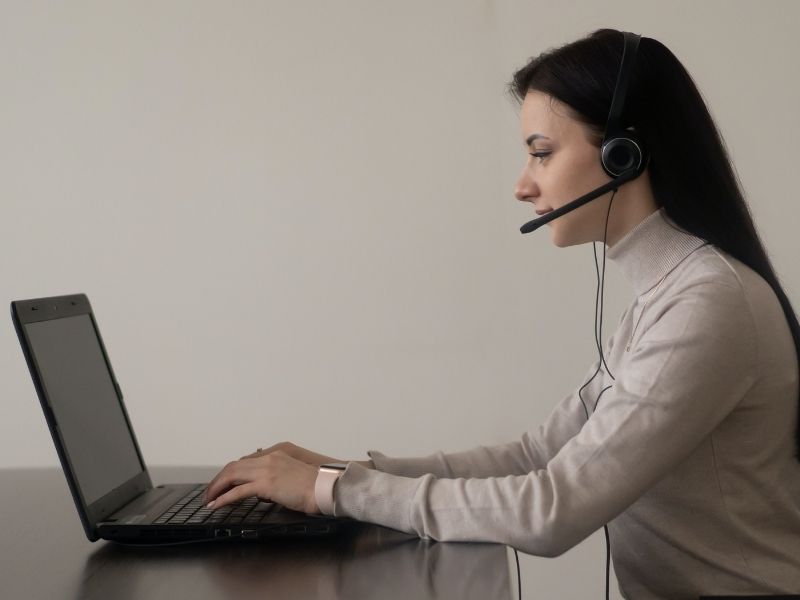 a lady working on a laptop