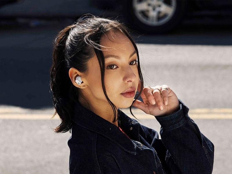 a girl wearing wireless earbuds
