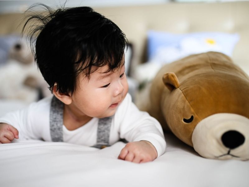 tummy time on bed