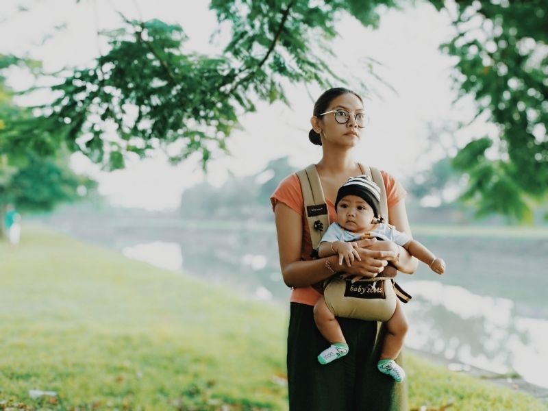 a woman with a baby