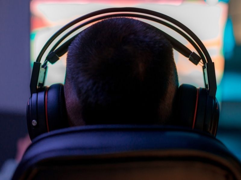 a guy wearing a pair of headphones