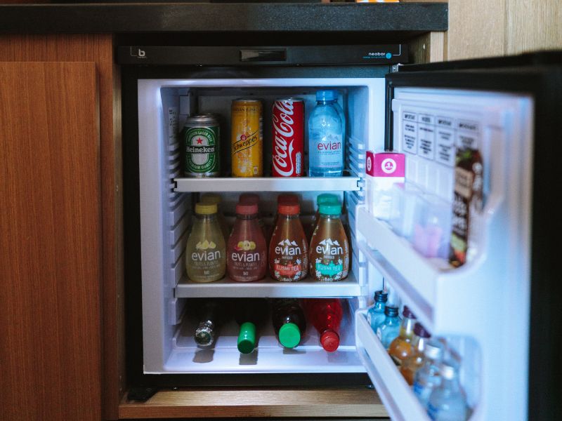 An opened mini fridge