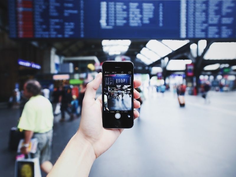 a person holding up a smartphone 