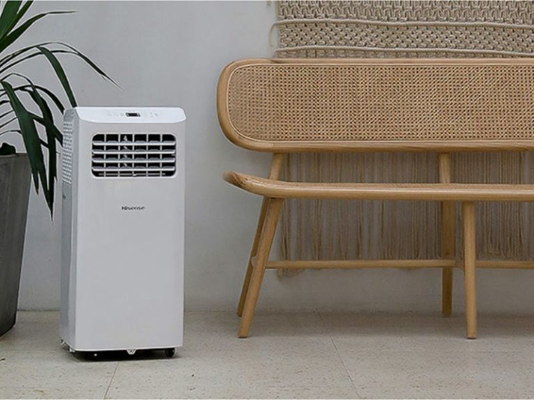 A portable air conditioner in a room setting