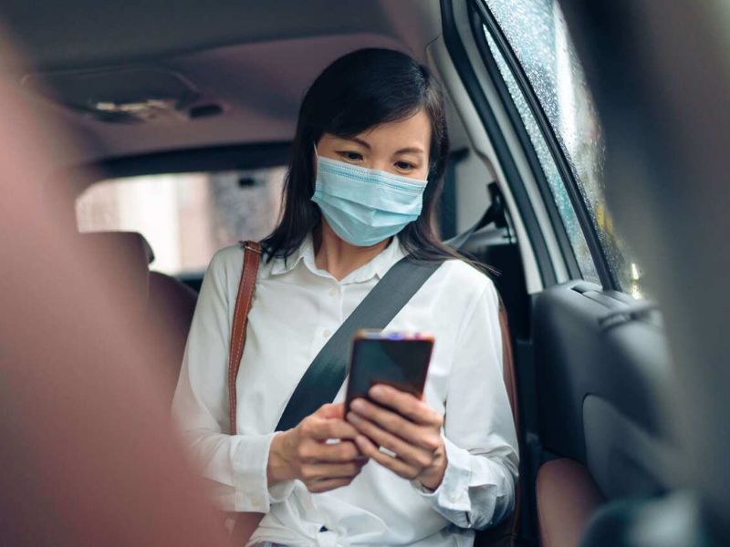 A lady passenger in a car