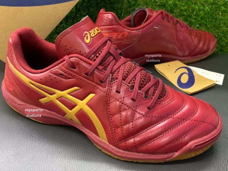 best futsal shoes asics red leather upper yellow logo
