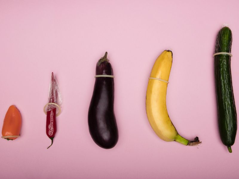 Condoms on various fruits and vegetables