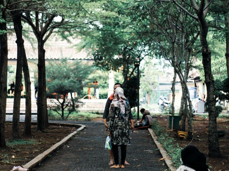 people in a park mother's day activities