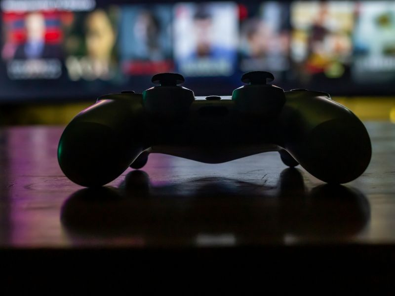 A game controller lying down on a table