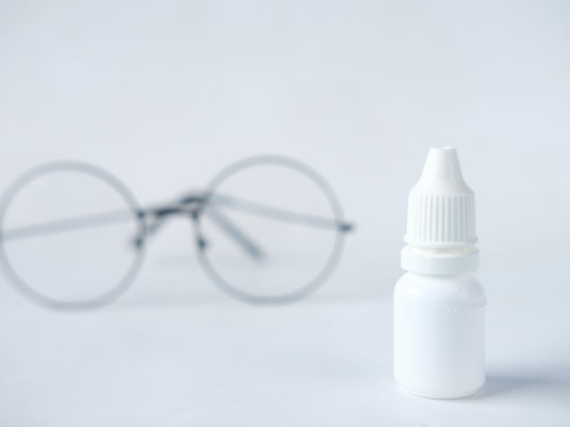 a pair of glass and a vial best eye drops malaysia